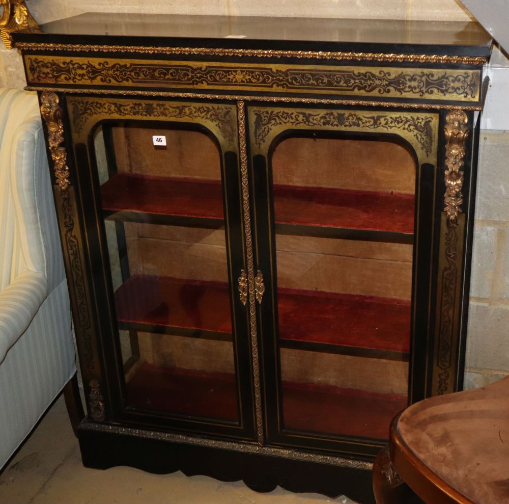 A 19th century ebony and boulle work two door glazed display cabinet, with ormolu mounts, W.105cm, H.121cm